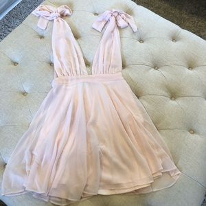 New with tags.  Light pink summer sexy dress